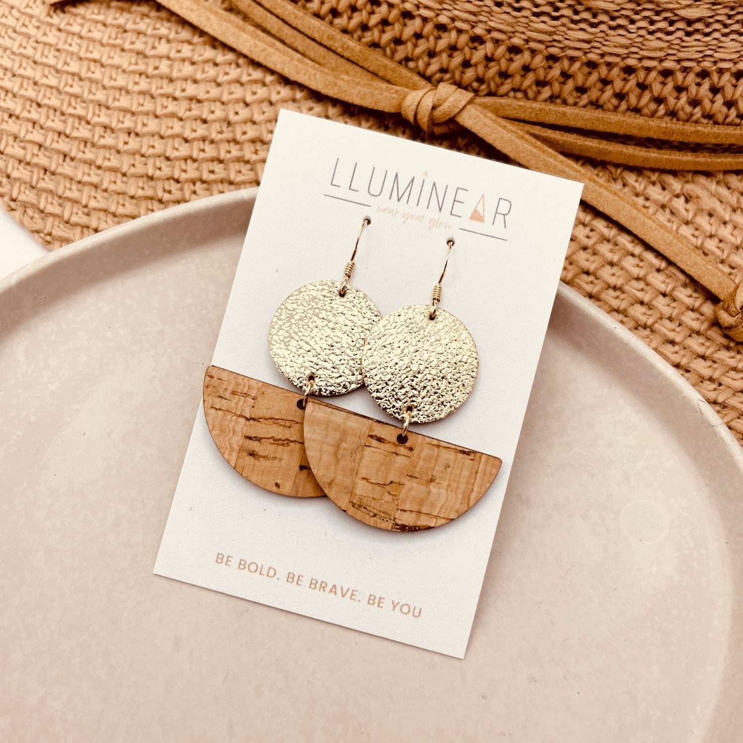 crescent moon earrings made with natural cork and real gold glitter leather with hypoallergenic 14ct gold filled hooks for sensitive ears.