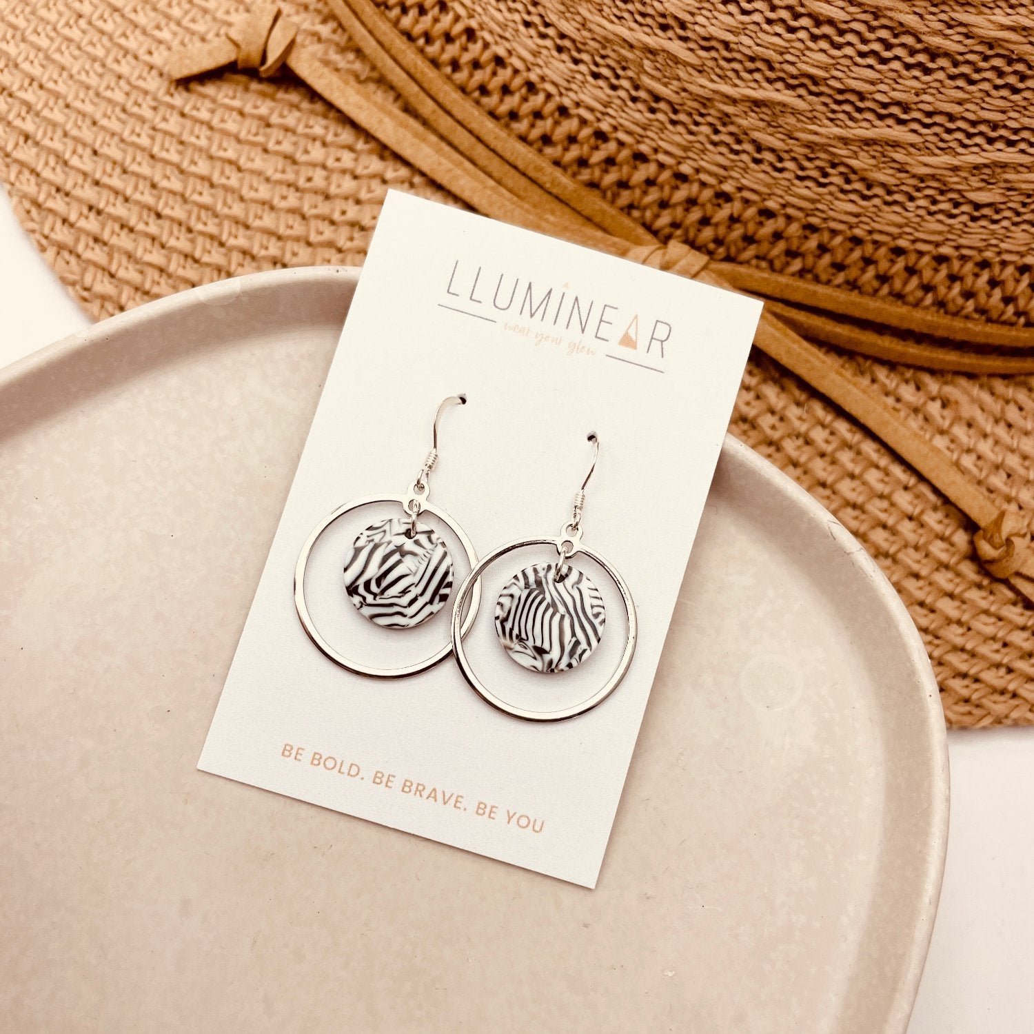 Hallmarked Sterling Silver Zebra Print Hook Earrings with silver ring.