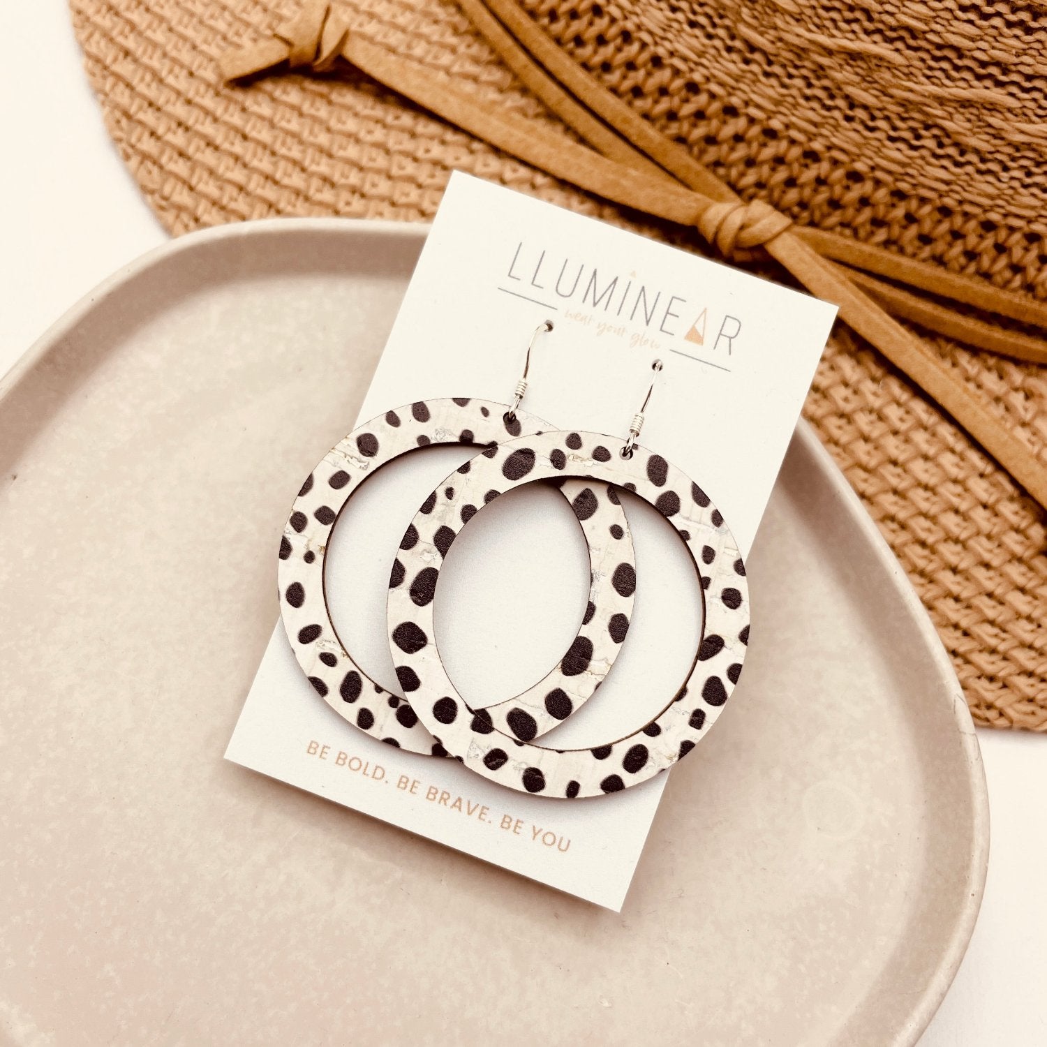 white and black spotty dalmatian print circle earrings handmade with hallmarked 925 sterling silver hooks.